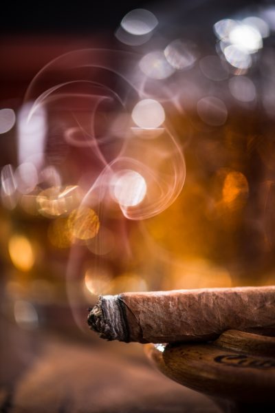 cuban-cigar-smoke-and-luxurious-cognac-in-carafe-2025-03-26-07-43-19-utc