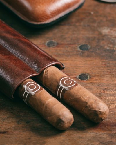 cuban-cigars-on-wooden-table-closeup-view-2024-12-07-19-27-00-utc